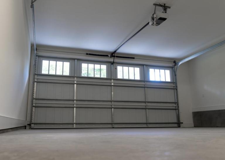 Installation de porte de garage à Saint-Quentin, mode d'emploi